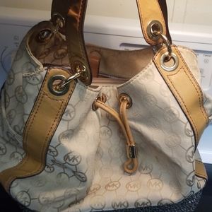 Micheal Kors a little worn shoulders straps